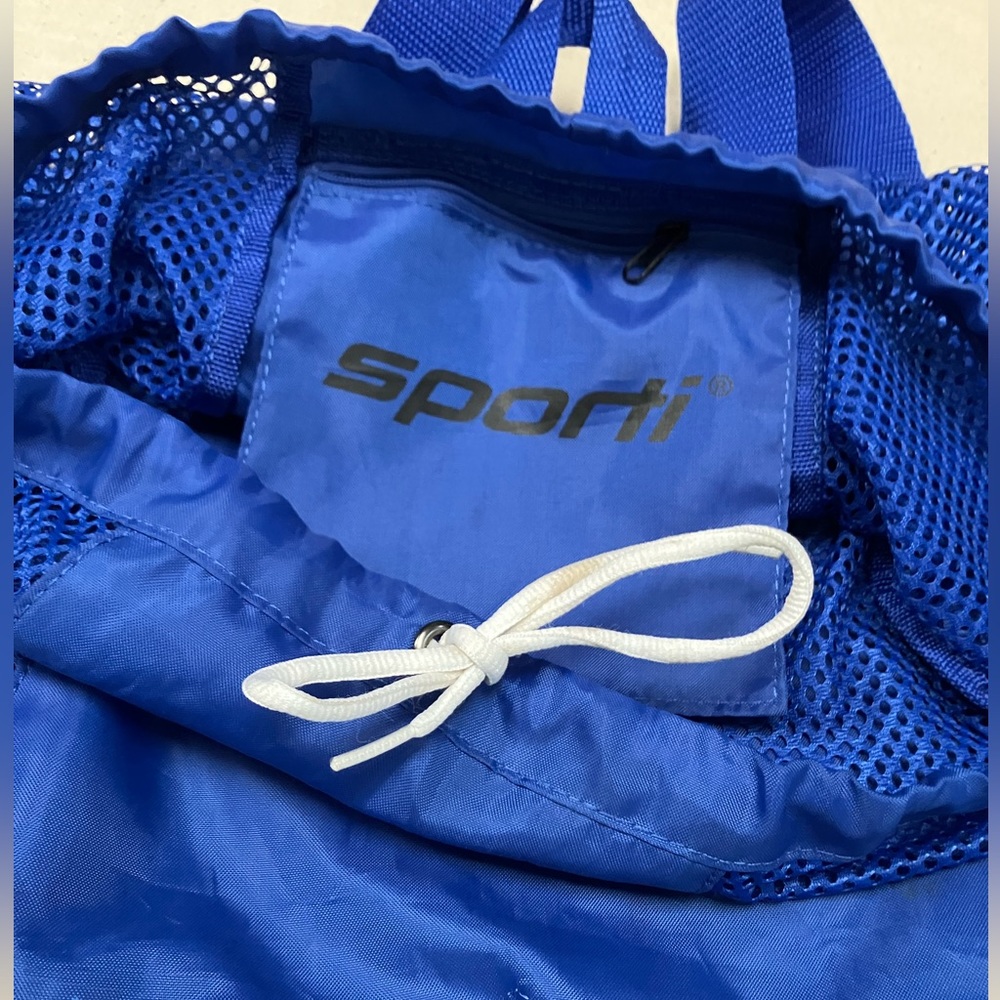 23”L by 17”W Sporti brand Drawstring Backpack. Inside pocket. ID window.